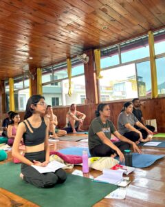 student practising yoga during yttc rishikul yogshala rishikesh