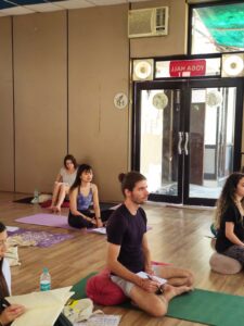 students practicing during 200 hour yttc