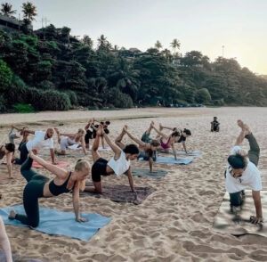 yoga on the beach rishikul yogshala kerala